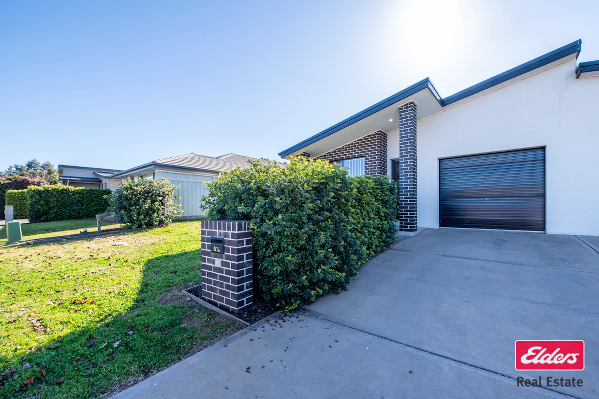 57B Champagne Drive — photo 2 of 18