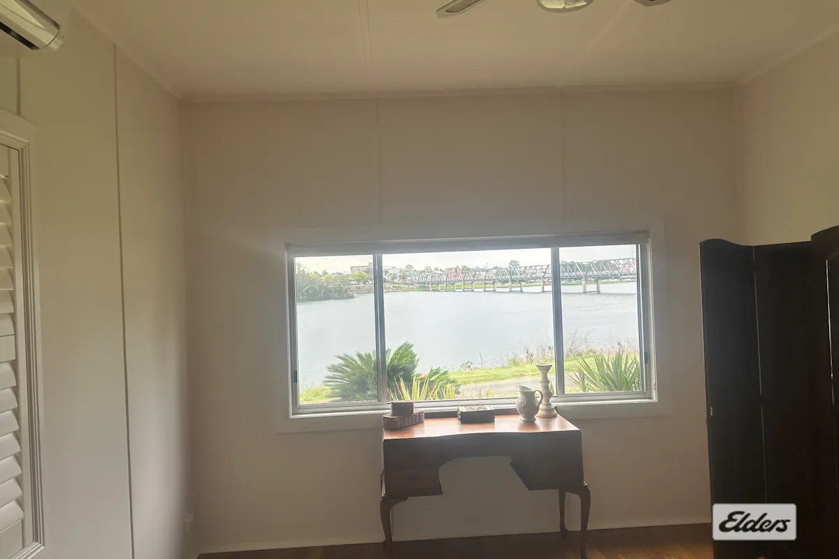 RIVERFRONT LIVING WITH STUNNING VIEWS — photo 13 of 18